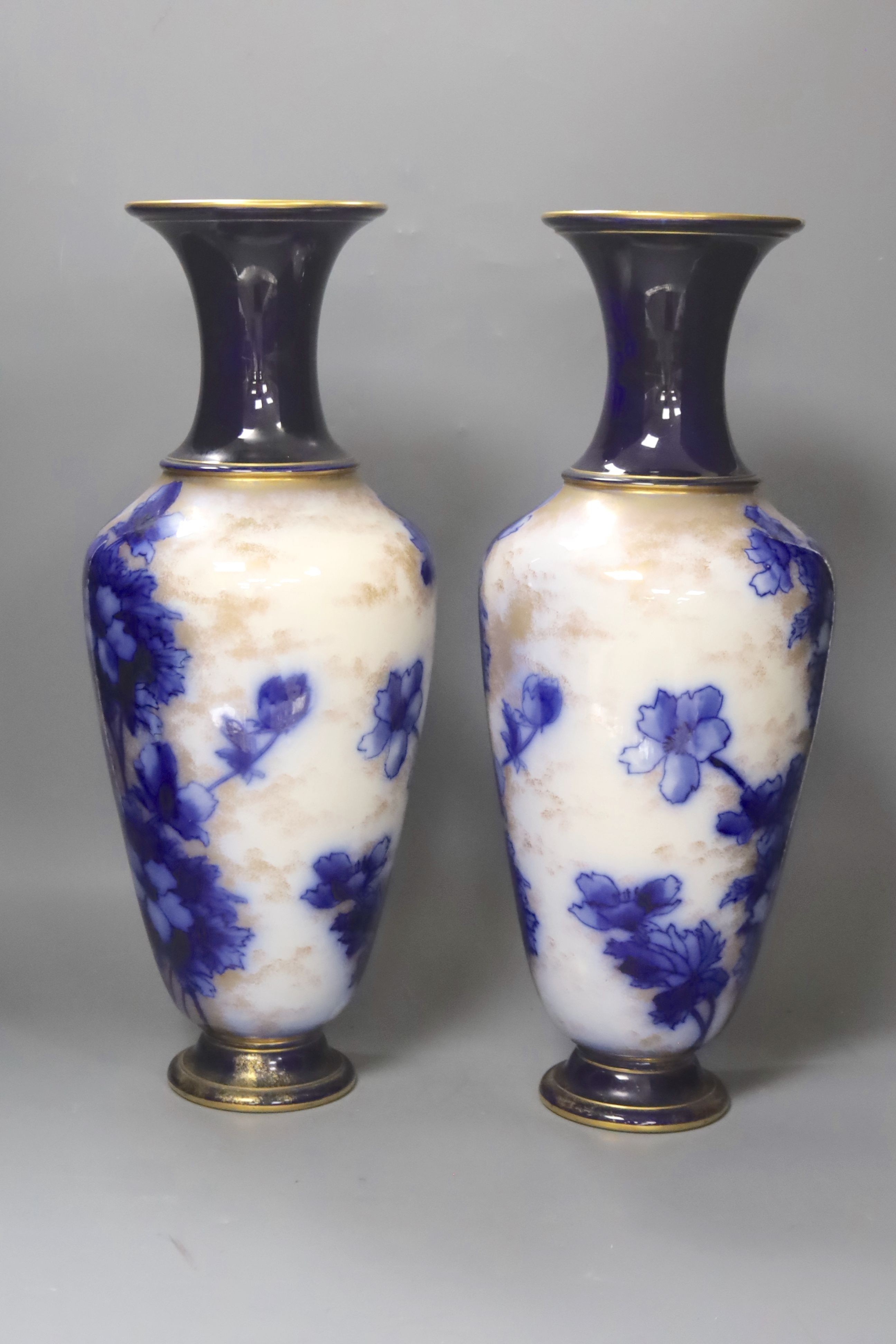 A pair of Doulton, Burslem vases c.1885, 44cm and a Masons ironstone teapot, c.1860